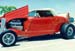 1932 Ford Highboy with rumble seat, and blown hemi.